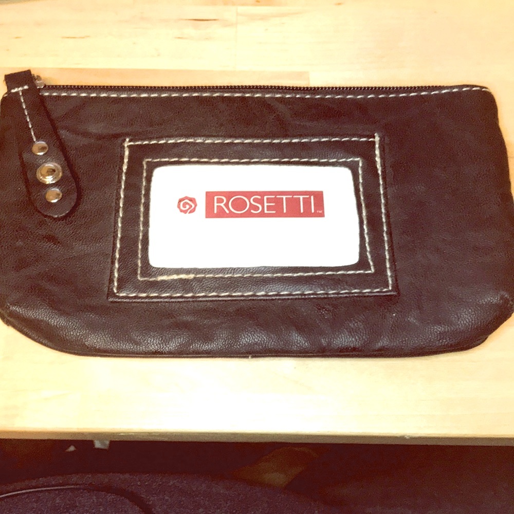 Rosetti wristlet in black faux leather new condition